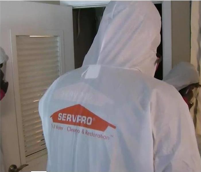 Servpro Technicians in Hazmat Suits